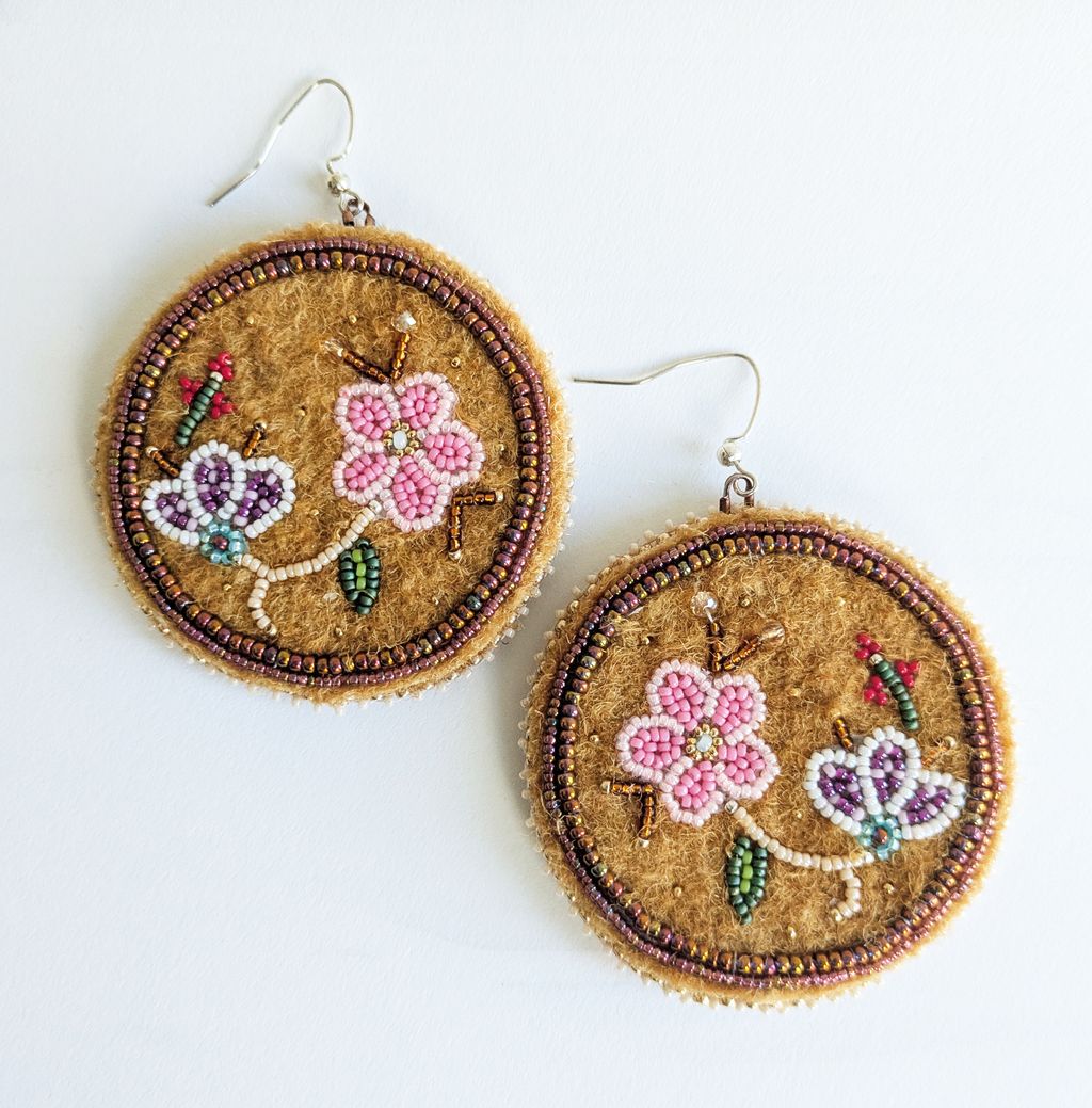 Beaded florals on smoked hide